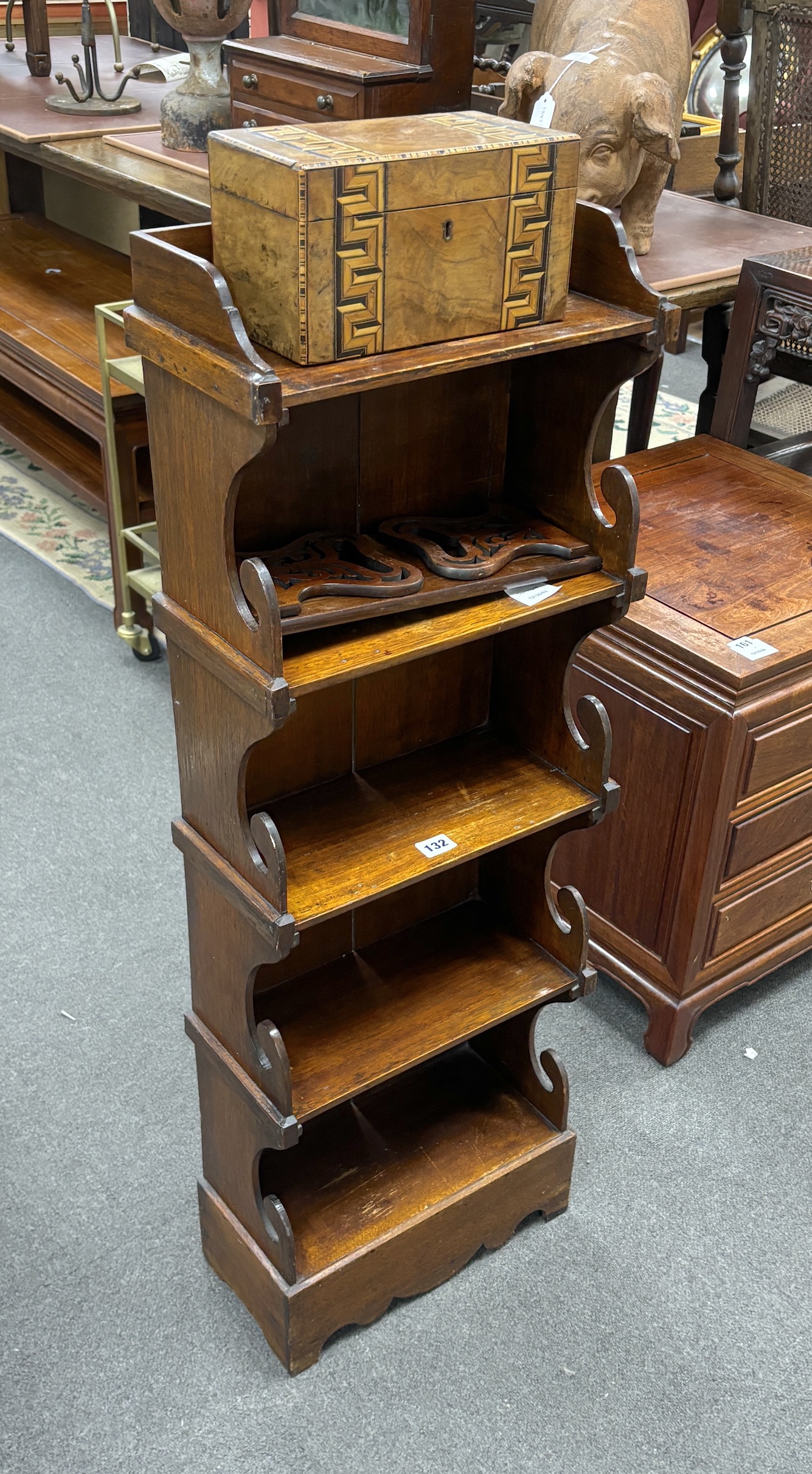 A Victorian style mahogany five tier narrow bookcase, width 36cm, depth 17cm, height 104cm, Victorian parquetry inlaid tea caddy and a Victorian bookslide